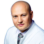 Толмах Роман Евгеньевич — хирург